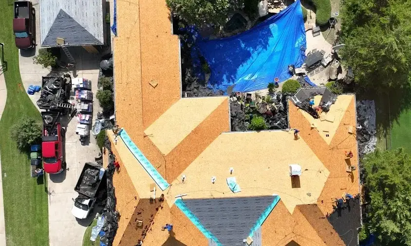 Professional Storm Damage Roof Repair being performed in Burleson