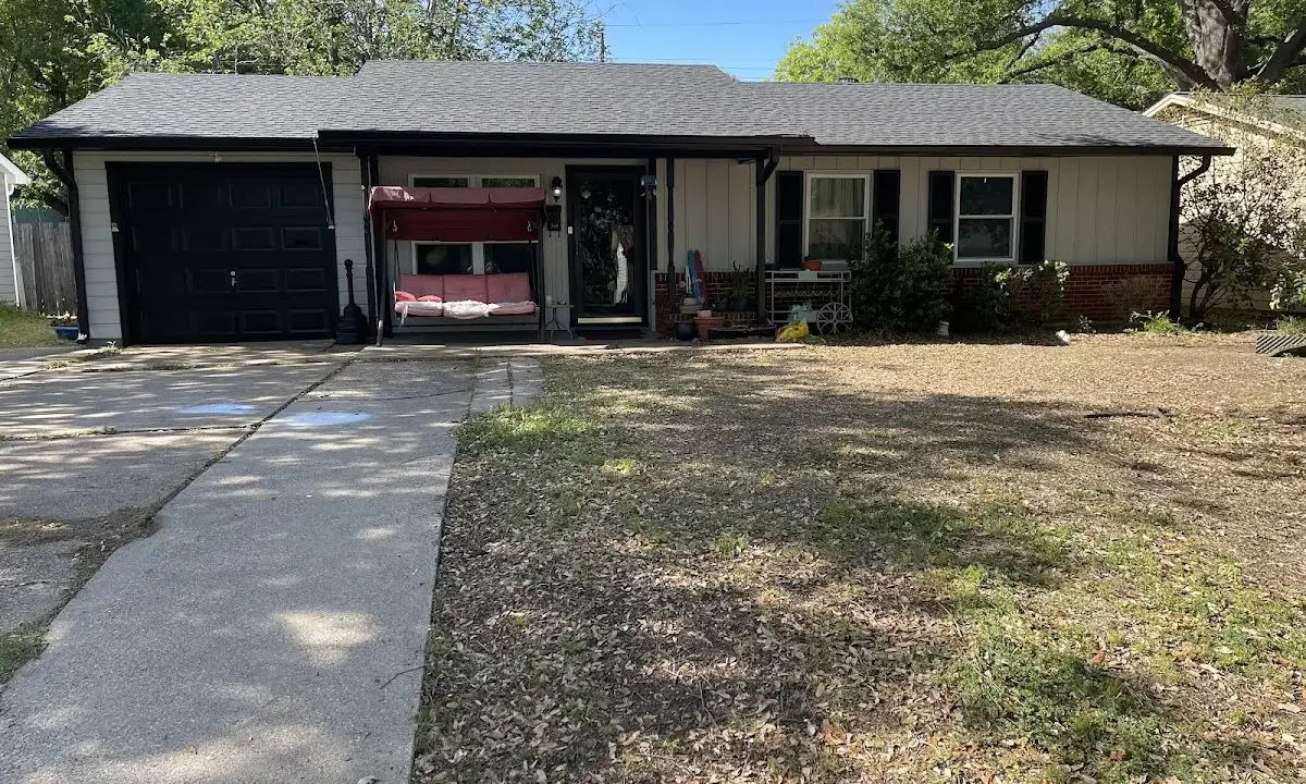 Asphalt Shingle Roof Repair crew at work on a residential roof in Burleson